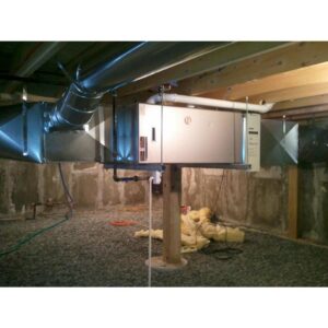 An air handler and ductwork installed in a basement by Pro-Tech Refrigeration in Auburn, ME.