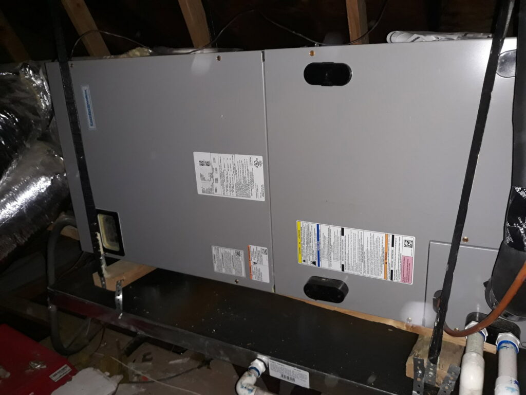 An air handler or furnace unit installed in an attic by Go West A/C & Heating in Fort Worth, TX.