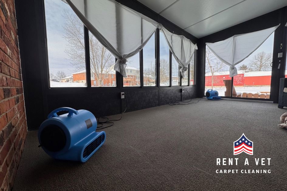 Blue air movers drying a freshly cleaned carpet in a sunroom by Rent A Vet Carpet Cleaning in St. Charles, MO.