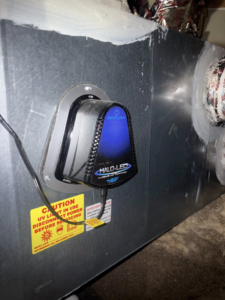 An air purification device installed on ductwork by Weather Masters, Inc. in Mesa, AZ.