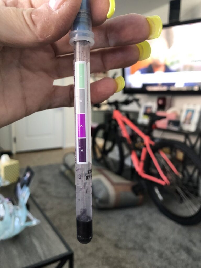 A test tube containing an air quality testing sample from APEX Clean Air in South Salt Lake, UT.