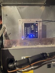An Air Scrubber indoor air quality system installed on ductwork by A-Team PHC in Olathe, KS.