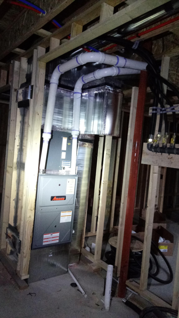An Amana furnace and extensive ductwork installation in a new construction or renovated space by Atmosphere Mechanical Heating And Air / Ventilation in Aurora, CO.