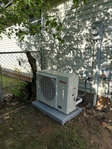 An Amana mini-split outdoor unit installed by One Hour Heating & Air Conditioning of Springfield in Springfield, MO.
