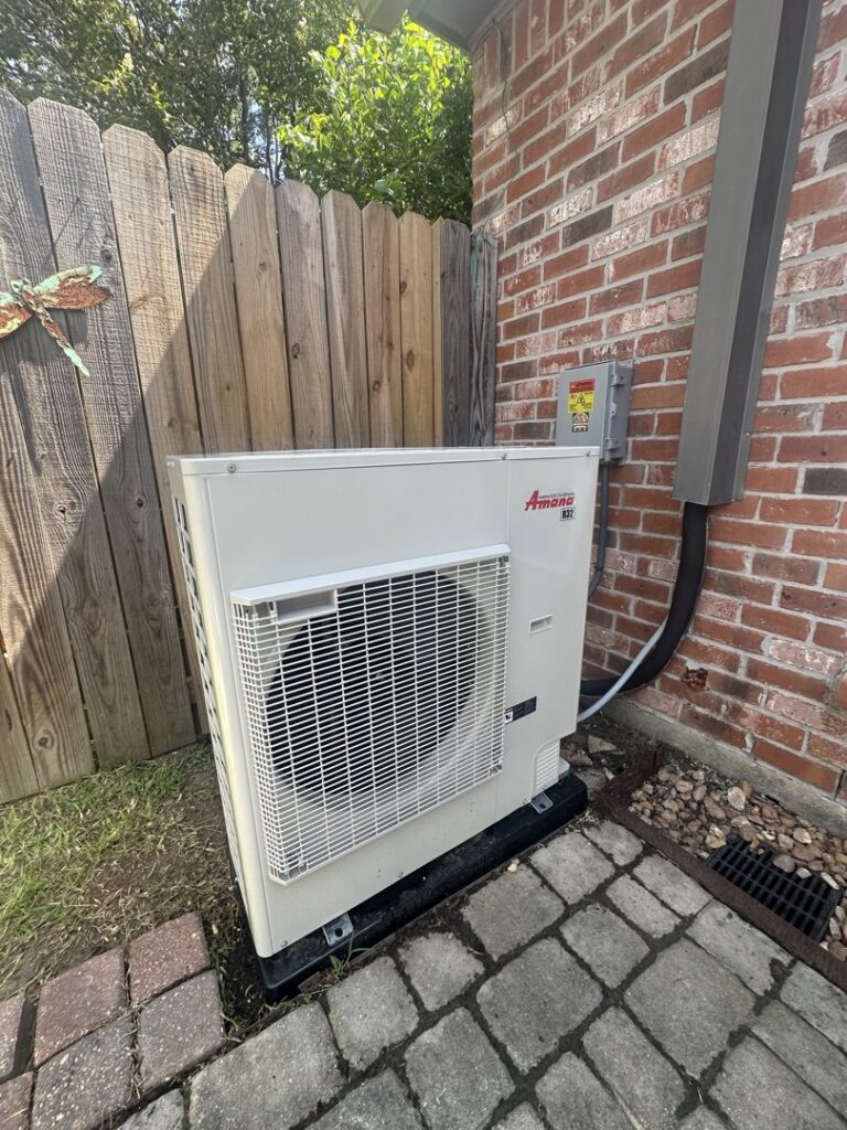 An Amana outdoor mini-split condenser unit installed at a residence by Grand Slam Heating & Air in Baton Rouge, LA.