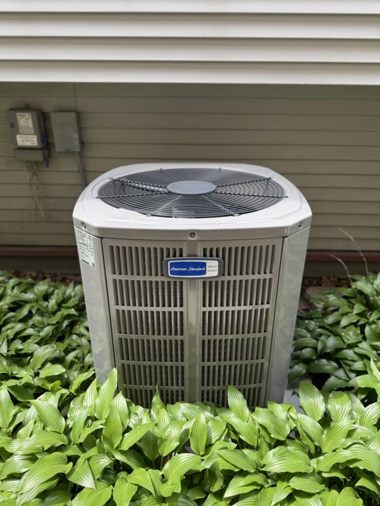 An American Standard outdoor air conditioning unit installed by Hvac Buddies in Chicago, IL