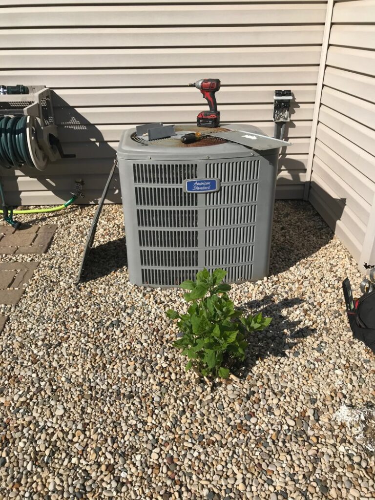 An American Standard outdoor AC unit after service by Wight's Heating & Air Conditioning in Rockford, IL