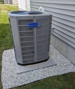 An American Standard outdoor air conditioning unit installed by PureTemp Heating and Cooling in Salem, NH.