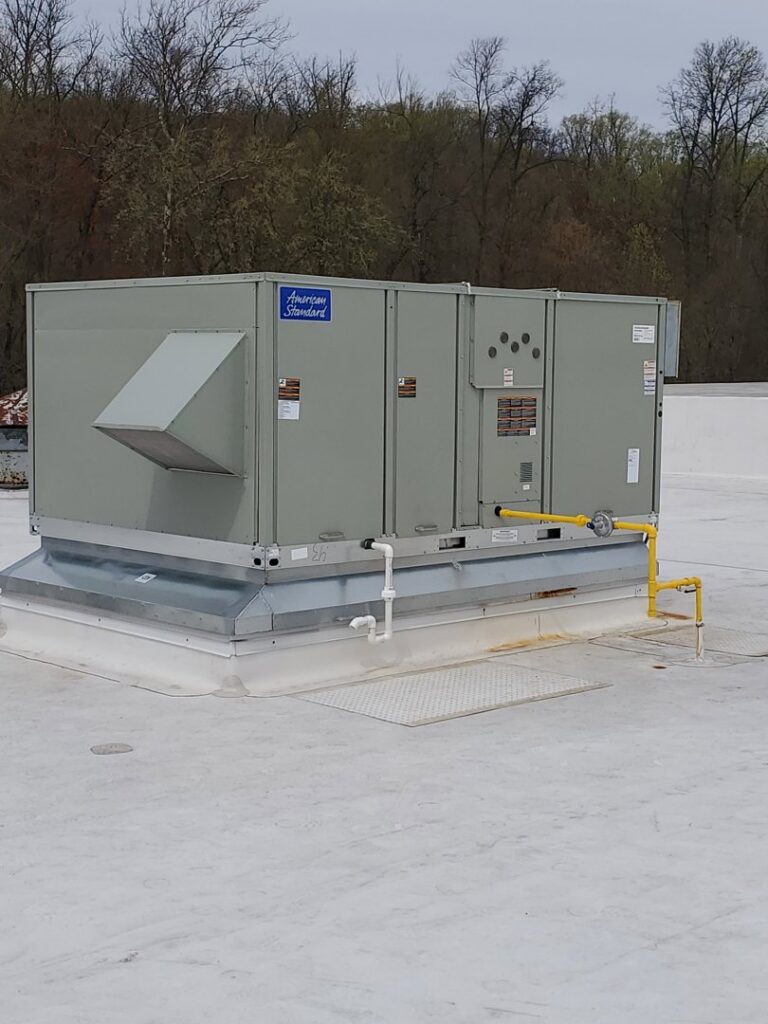 An American Standard rooftop HVAC unit on a commercial building, installed by Capitol Heating and Air in Morgantown, PA.