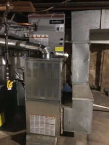 An Ameristar brand furnace and air handler unit with ductwork installed by Air Done Right in Philadelphia, PA.