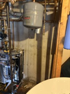 An Amtrol expansion tank and associated piping installed by All In One Home Services in Denver, CO.