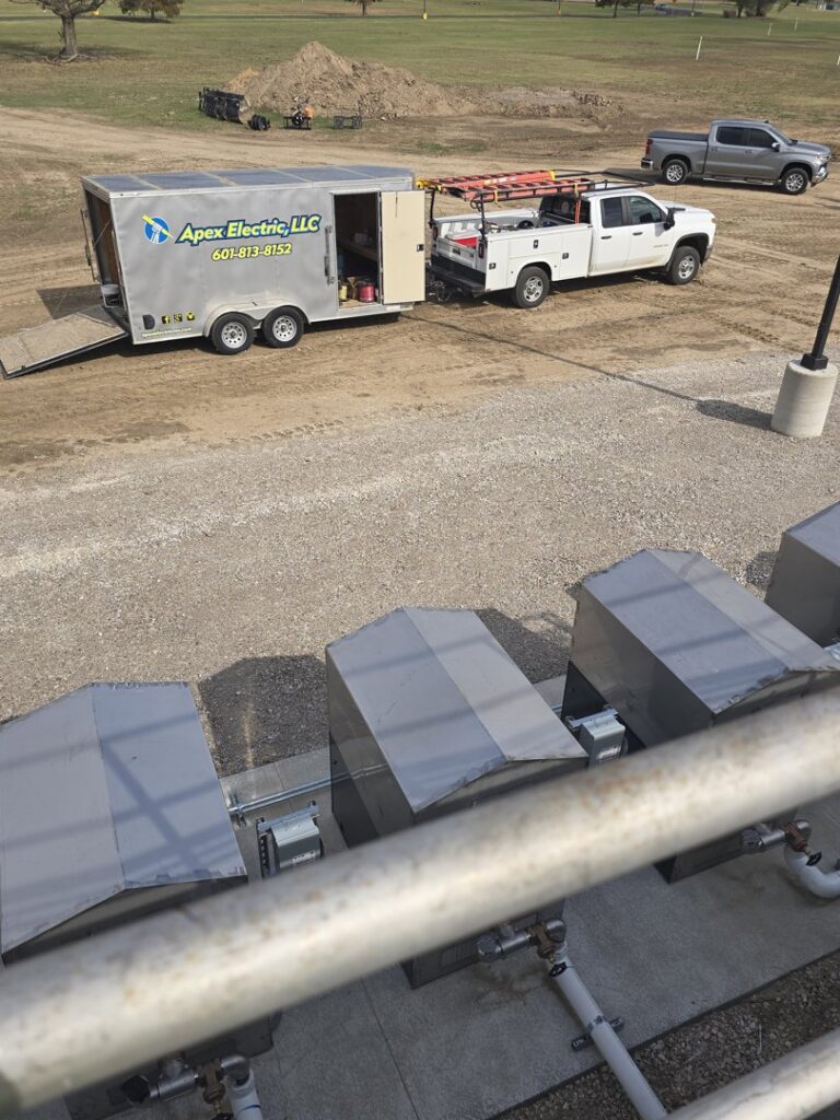 An Apex Electric LLC utility truck and trailer parked at a job site, ready for electrical services in Brea, CA.