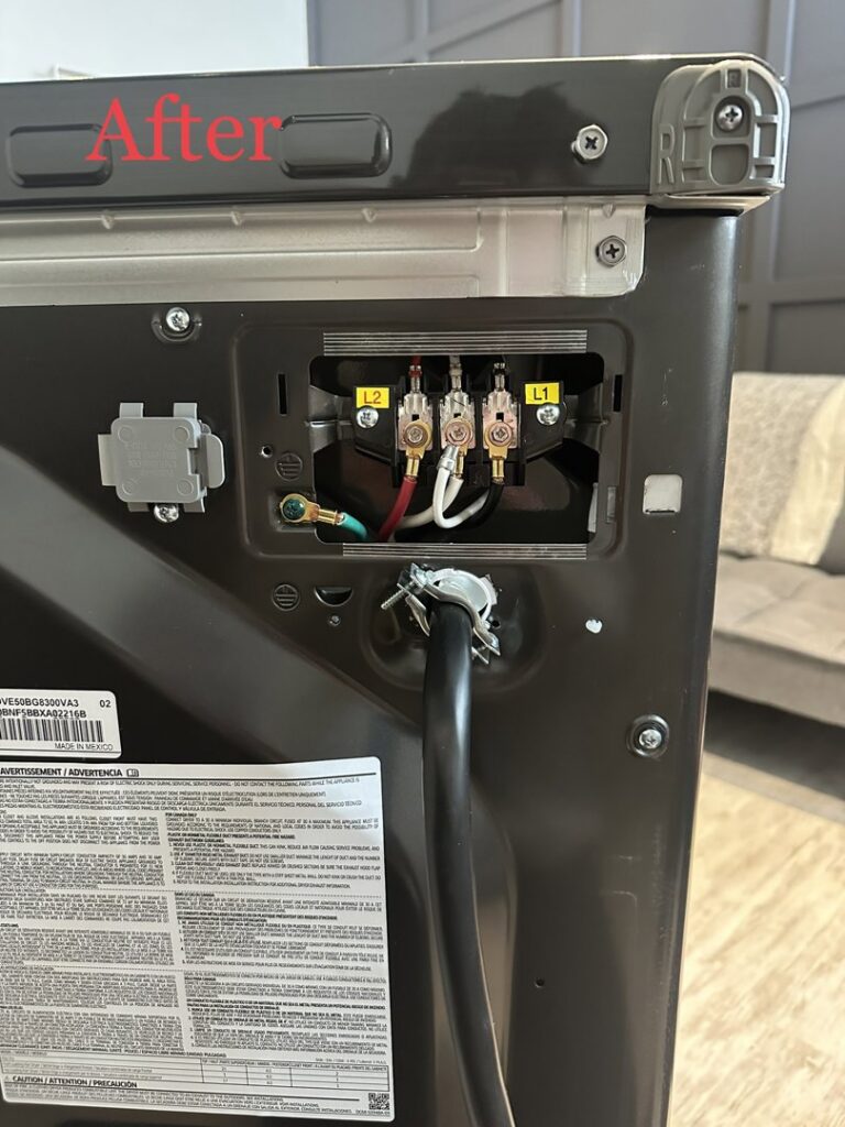 The 'after' view of an appliance's electrical connection, showing proper wiring by Sunrise Electric LLC in Kalispell, MT.