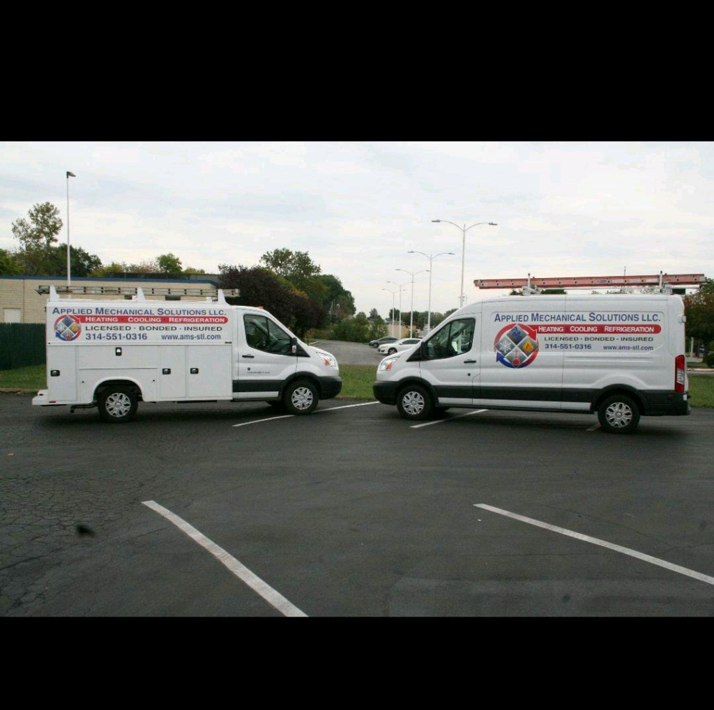 Two branded service vans for Applied Mechanical Solutions, an HVAC contractor in Hazelwood, MO, ready for jobs.