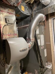 An Aprilaire whole-home humidifier system installed with a Lennox furnace by Trusted HVAC in Martinsburg, WV