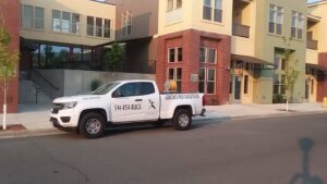 Arbon's Pest Solutions llc truck with equipment lights on, ready for pest removal services in Medford, OR.