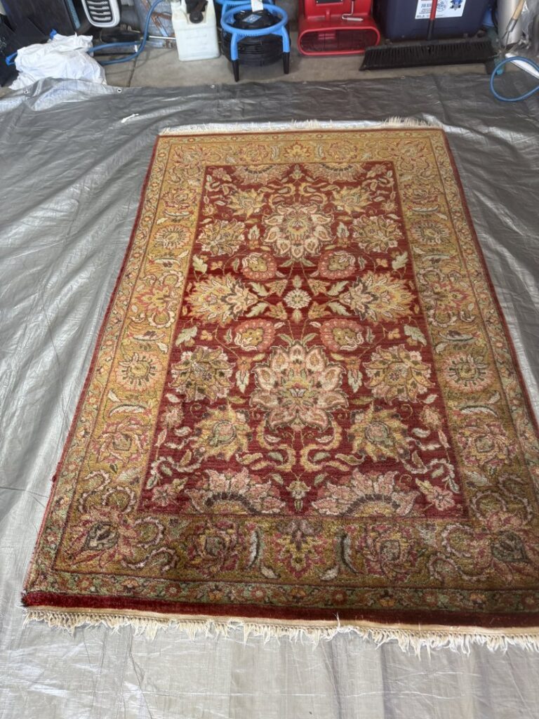 A decorative area rug laid out for professional cleaning by Believe That Carpets & Upholstery Cleaning in Colorado Springs, CO.