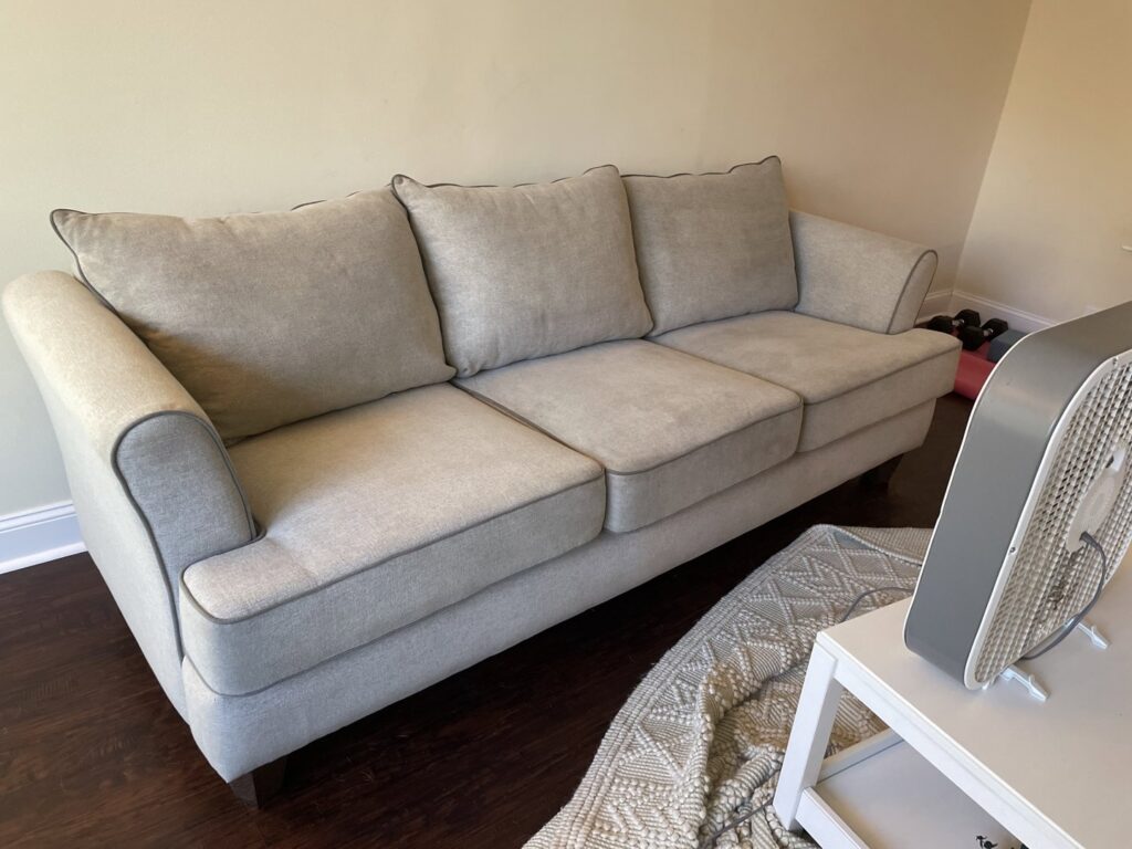 An area rug drying with a fan after professional cleaning by Anderson Certified, INC. in Chicago, IL.