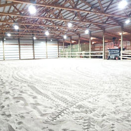 New overhead lighting installed in a large indoor arena by Balanced Electric LLC in Caldwell, ID.