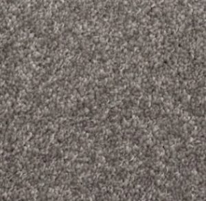 An outdoor balcony featuring a green artificial turf carpet installation by Bronco Carpets and Flooring in Caldwell, ID.