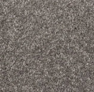 An outdoor balcony featuring a green artificial turf carpet installation by Bronco Carpets and Flooring in Caldwell, ID.