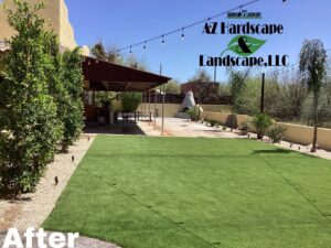 Newly installed artificial turf lawn with gravel and string lights by AZ Hardscape & Landscape LLC in Phoenix, AZ.