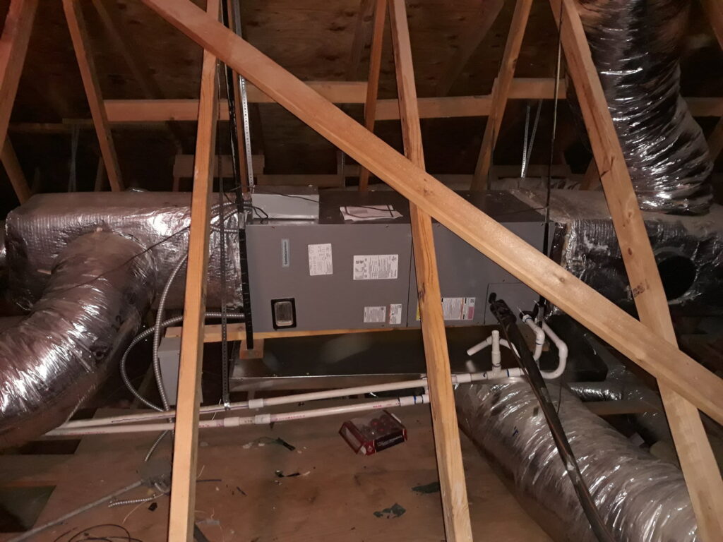 An attic air handler and ductwork installation by Go West A/C & Heating in Fort Worth, TX.