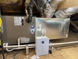 An air handler unit and ductwork installed in an attic by MB Heating and Air in Northridge, CA.