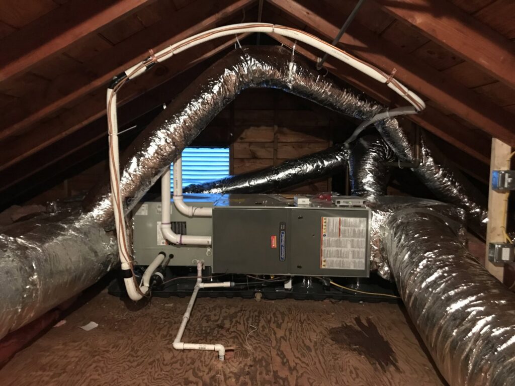A complete air handler unit and ductwork system installed in an attic by Hyper Fusion Heating & Cooling in Waterbury, CT.