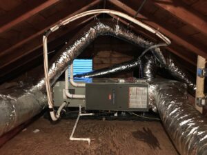 A complete air handler unit and ductwork system installed in an attic by Hyper Fusion Heating & Cooling in Waterbury, CT.