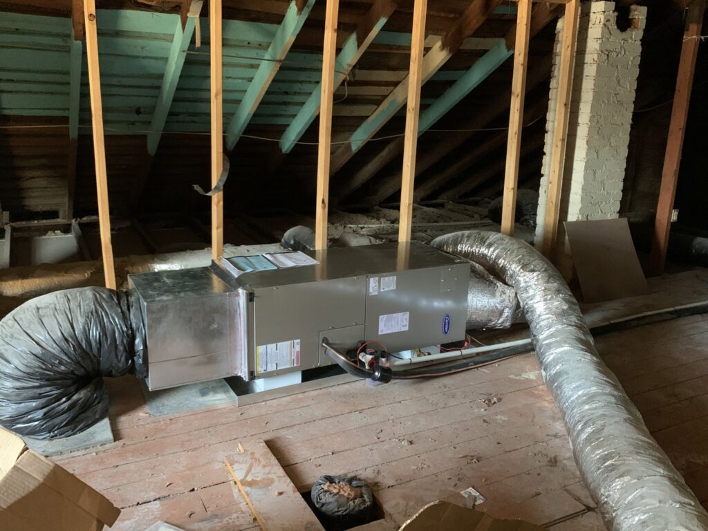 An air handler unit with flexible ductwork installed in an attic by Air Energy Solutions in North Chesterfield, VA