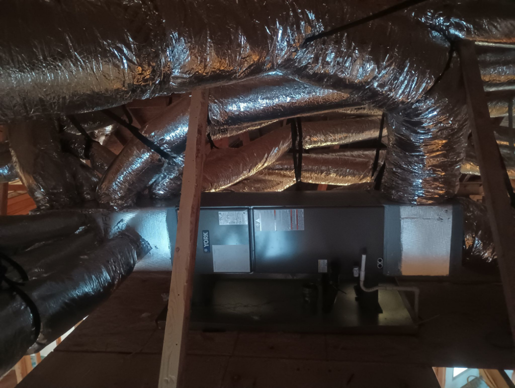 New YORK air handler and insulated ductwork installed in an attic by Air Prime OKC in Oklahoma City, OK