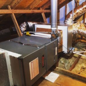 An air handler unit and ductwork installation in an attic by Caballero's A/C & Heating in Marrero, LA.