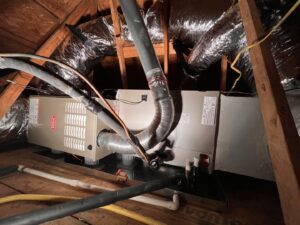 A Bryant air handler and ductwork installed in an attic space by Reliable Heating and Air LLC in Summerville, SC.