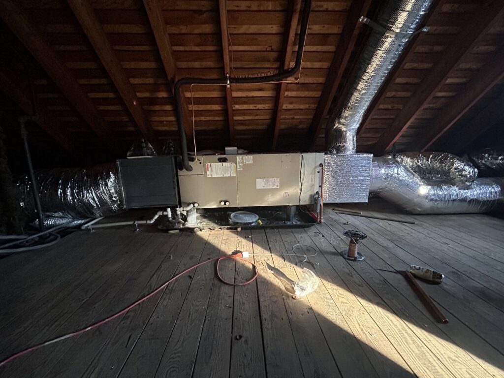 An air handler and ductwork installation in an attic by Express Home Services LLC in Las Vegas, NV.