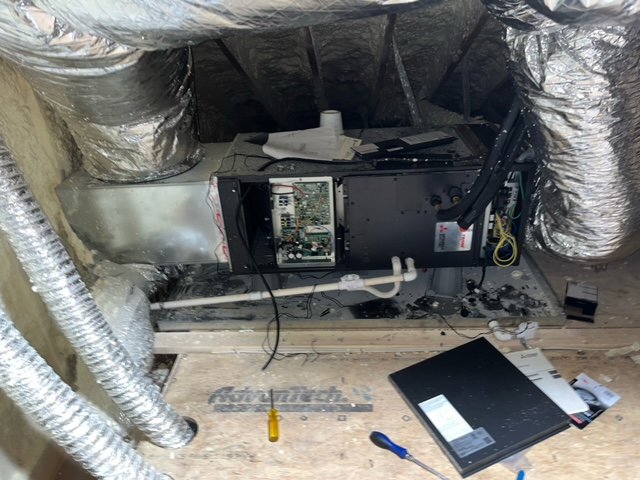 An attic air handler unit undergoing repair or installation by CHIN Flower HVAC LLC in Murfreesboro, TN.