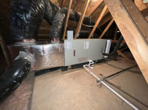 An air handler unit with insulated ductwork installed in an attic by 20th Century Heating and Air in Anaheim, CA.