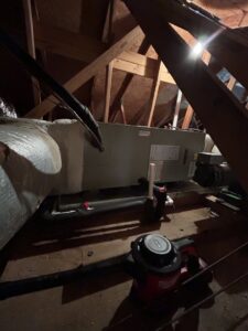 An air handler unit installed in an attic space by AC Heating and Air Conditioning Services in Charleston, SC.