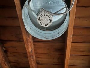 An attic fan installation with visible wiring, expertly handled by Decatur Electrician Now in Decatur, AL.