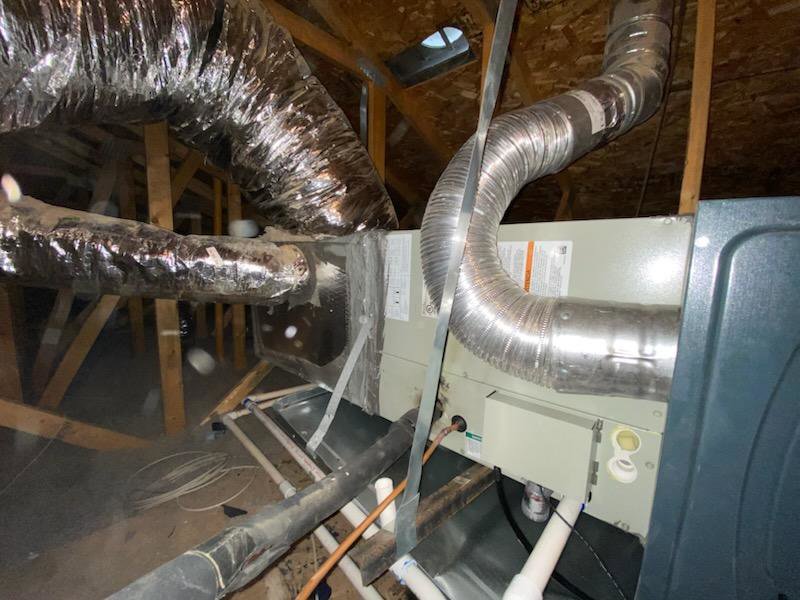 An attic furnace unit with flexible ductwork installed by Sun Devil Heating & Cooling INC in Peoria, AZ.