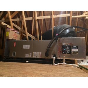 A Bryant furnace and air handler unit installed in a residential attic by Ware's Heating & Cooling in Georgetown, KY.