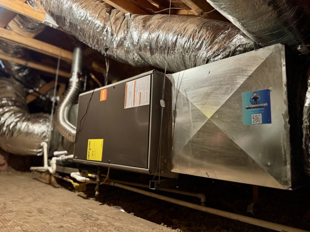 An HVAC air handler unit and ductwork installed in an attic by Mi Amigo HVAC in Surprise, AZ
