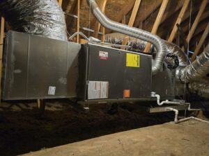 An indoor HVAC air handler and extensive ductwork installed in an attic space by State 48 Home Comfort LLC in Peoria, AZ.