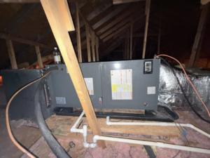 An HVAC air handler unit installed in an attic by Affordable heating and air conditioning in Meridian, MS.