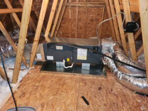 An HVAC air handler unit and ductwork installed in an attic by Borte Mechanical Services LLC in Chesapeake, VA