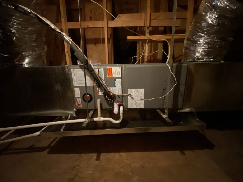 An HVAC air handler unit installed in an attic by Kings of AC, LLC in Queen Creek, AZ.