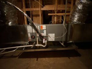 An HVAC air handler unit installed in an attic by Kings of AC, LLC in Queen Creek, AZ.