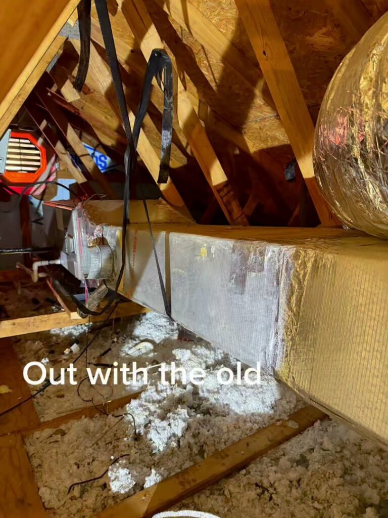 Attic space showing old HVAC ductwork and an air handler being replaced by Mission HVAC in Huntsville, AL.