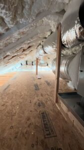 HVAC ductwork installation in an attic space by AC Heating and Air Conditioning Services in Charleston, SC.
