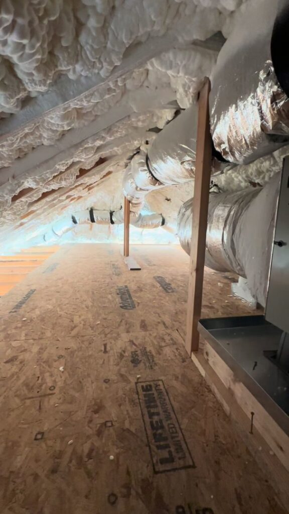HVAC ductwork installation in an attic space by AC Heating and Air Conditioning Services in Charleston, SC.